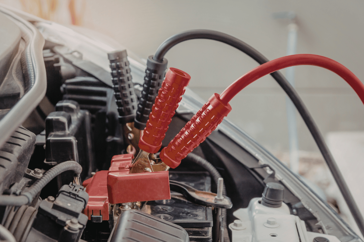 jump start car cables battery close up