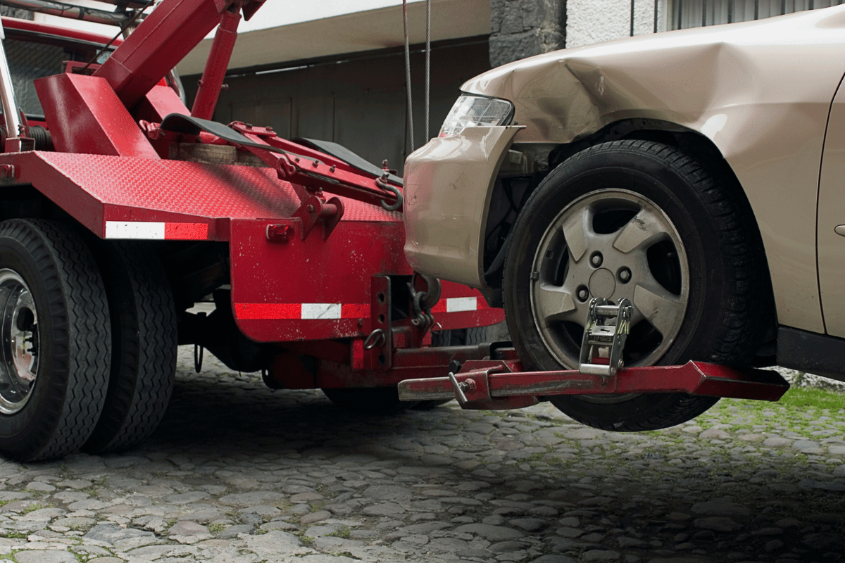 wheel lift tow truck towing car