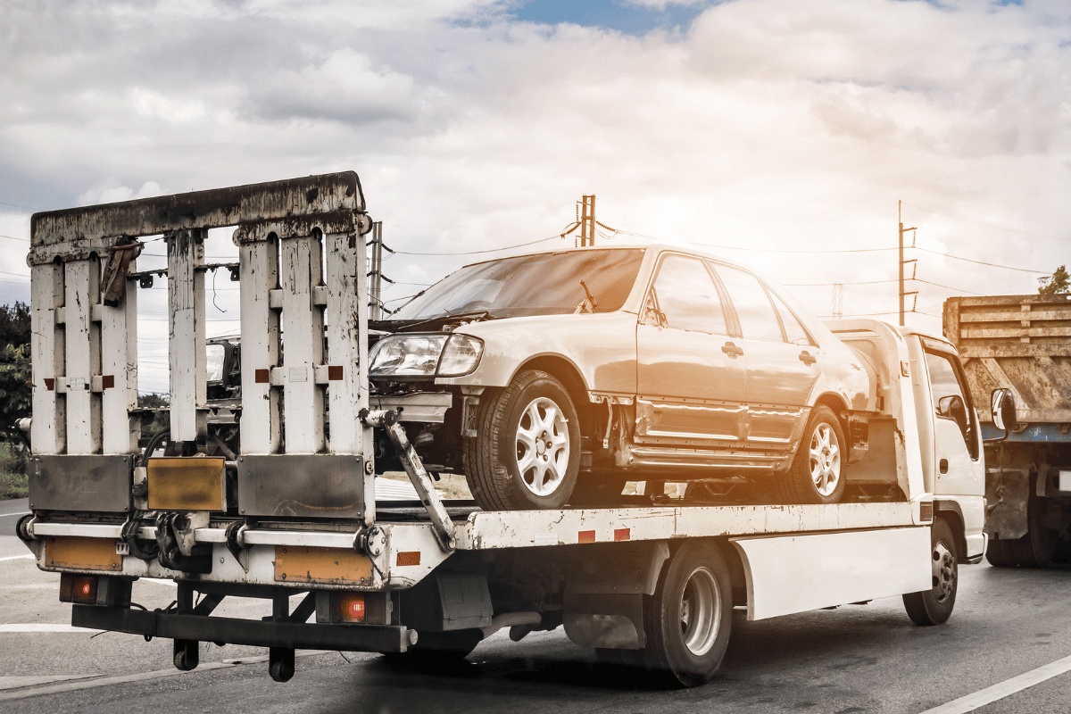 car accident towing flatbed truck