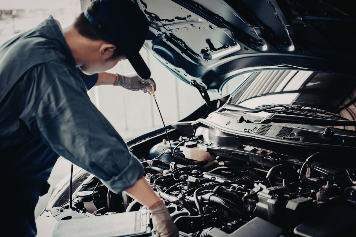 car alternator engine close up mechanic repair under hood