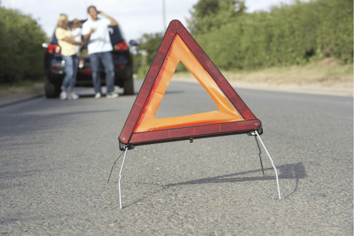 family stranded car roadside