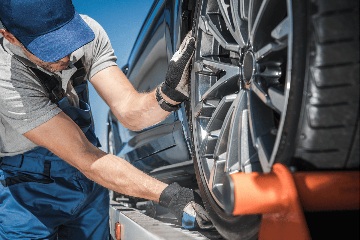tow truck battery boost flat tire collage