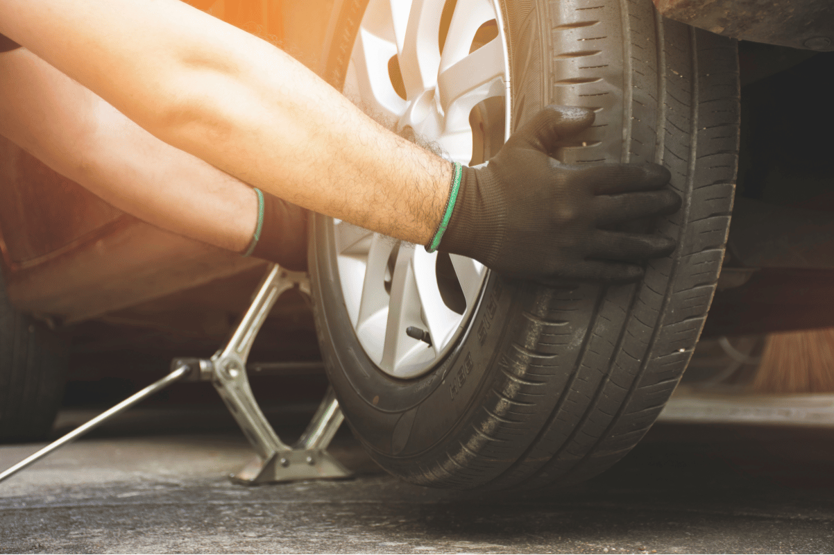 Changing flat tire roadside